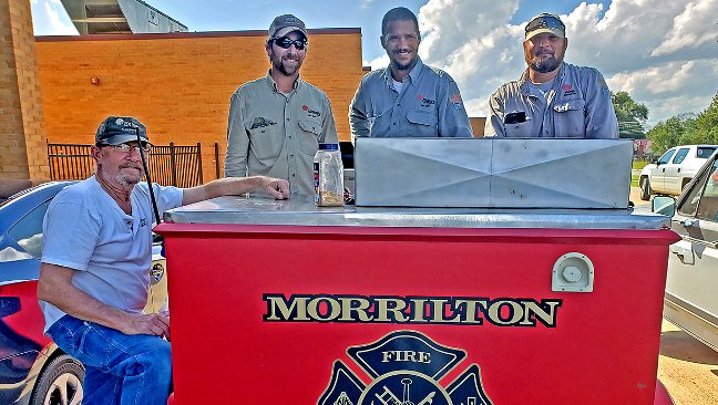 Grill team volunteers Steve Trowbridge, Josef Kirkendoll, Sammy Pledger and David Dufresne. Not pictured is Larry Simpson.